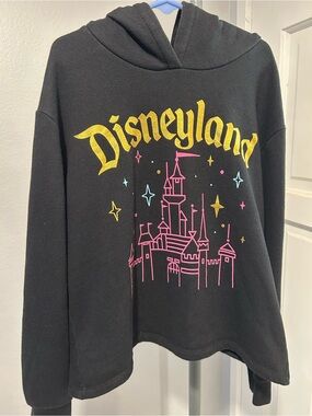 Disney Black Hoodie with Yellow Disneyland Text and Pink Castle Graphic